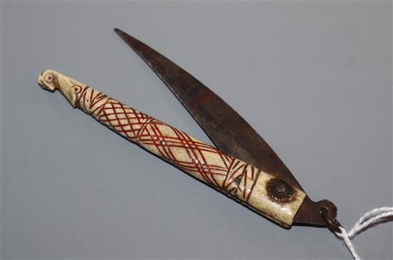 An Antique North American Indian? bone penknife, carved with a birds head 16.5cm